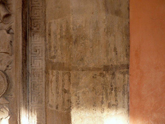 "Opera dei liberatori" - Scritta apparsa dopo il bombardamento dell'Archiginnasio ancora visibile accanto al portone d'ingresso
