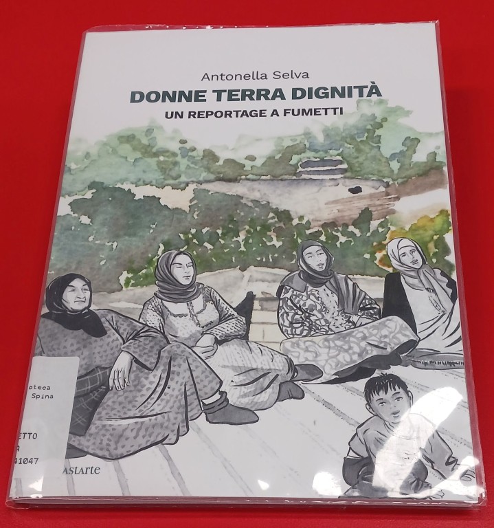 image of Donne terra dignità. Un reportage a fumetti