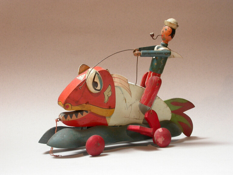 immagine di Pinocchio che cavalca il pesce-cane