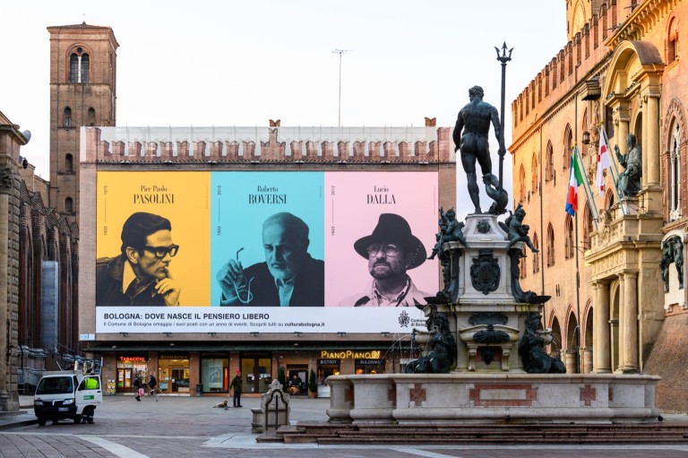 immagine di Una maxiaffissione in piazza Maggiore ricorda Dalla, Roversi e Pasolini