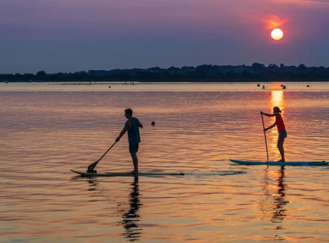 copertina di Sunset Paddle – Escursione in canoa, tramonto e sangria